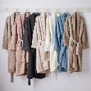 fcaba9be-f1f8-42ac-9c8d-07a5cc765321--2022-0114_sunday-citizen_cozy-snug-waffle-robe_family_silo_mj-kroeger.webp