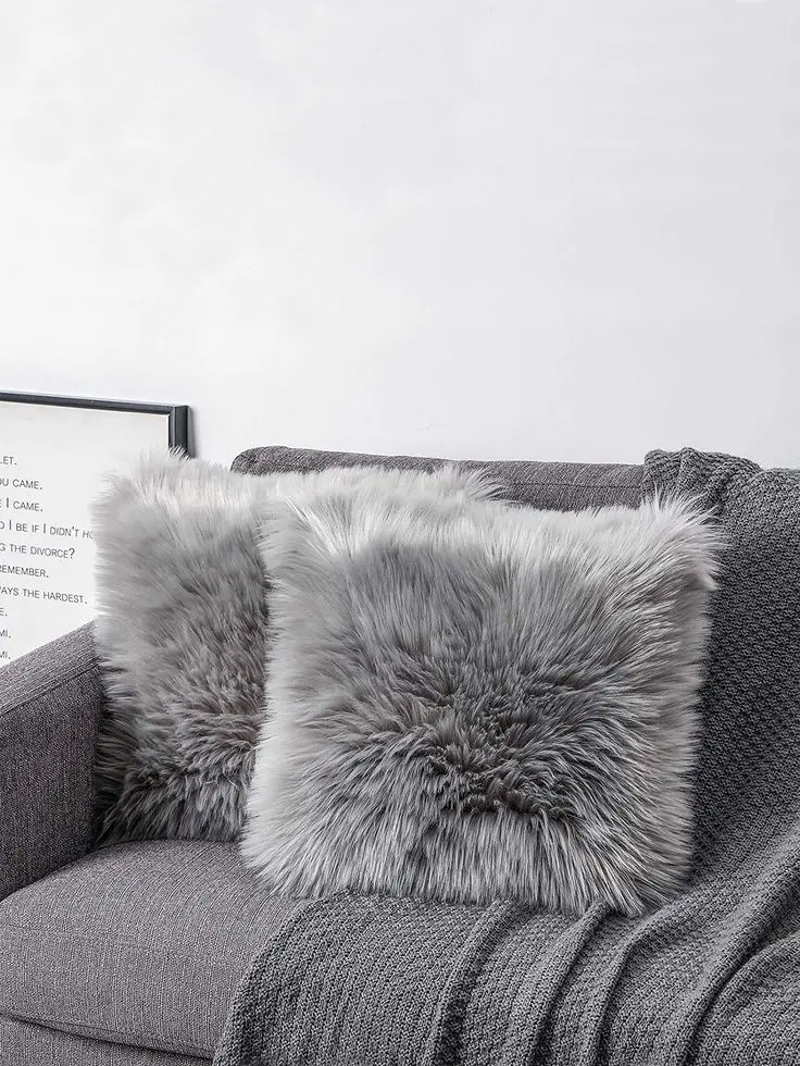 A Pair of Faux Rabbit Fur Cushions