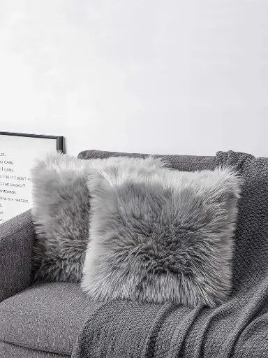 A Pair of Faux Rabbit Fur Cushions